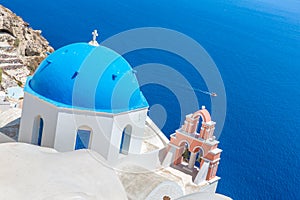 The most famous church on Santorini Island,Crete, Greece. Bell tower and cupolas of classical orthodox Greek church