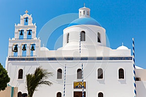 The most famous church on Santorini Island,Crete, Greece. Bell tower and cupolas of classical orthodox Greek church