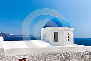 The most famous church on Santorini Island,Crete, Greece. Bell tower and cupolas of classical orthodox Greek church