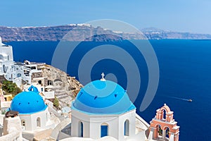 The most famous church on Santorini Island, Crete, Greece. Bell tower and cupolas of classical orthodox Greek church