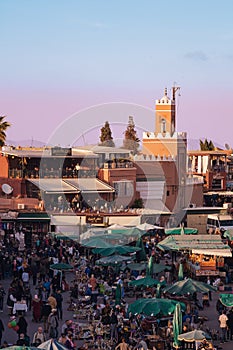 Spectacular sunset in the famous Jemaa El Fna square in Marrakech Morocco