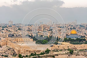 Most important world holy places. Panorama of the old city Jerusalem, the Dome of the Rock, monumental defensive walls. Israel