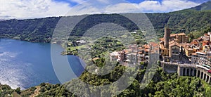 Most scenic lakes of Italy - volcanic Lago di Nemi , aerial drone view of Nemi village and volcano crater.