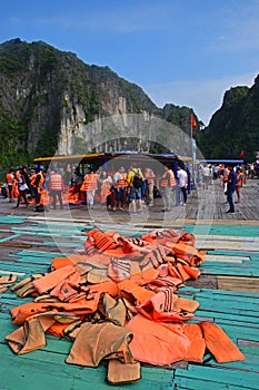 Massive amount of tourists at transfer point from Junk Ship to Small Rowing Bamboo Boat in Halong Bay for Day Trip