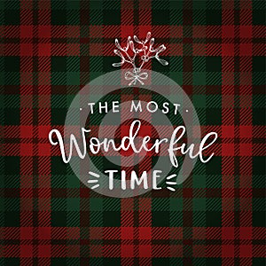 The most wonderful time. Christmas greeting card, invitation with hand drawn mistletoe and white text over tartan