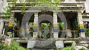 Mostar, Bosnia and Herzegovina - April 2019: Palace bombed during the 1992-1995 Bosnian War facing the Zrinjski City Park
