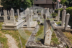 MOSTAR, BOSNIA AND HERZEGOVINA - JUNE 10, 2019: Cemetery at Karadoz Beg Mosque in Mostar. Bosnia and Herzegovi