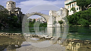 Mostar, Bosnia and Herzegovina. The Old Bridge, Stari Most, with emerald river Neretva
