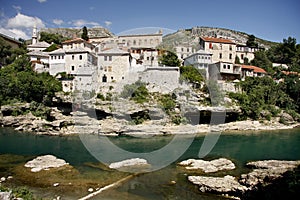 Mostar city seen from the river Neretva