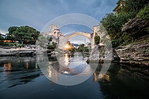 Mostar medieval ottoman stone bridge in Bosnia and Herzegovina in Balkan over Neretva river