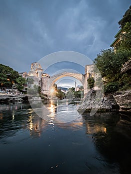 Mostar medieval ottoman stone bridge in Bosnia and Herzegovina in Balkan over Neretva river