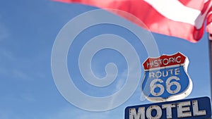 Motel retro sign on historic route 66 famous travel destination, vintage symbol of road trip in USA. Iconic lodging