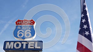 Motel retro sign on historic route 66 famous travel destination, vintage symbol of road trip in USA. Iconic lodging signboard in