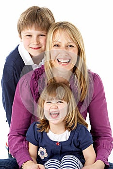 Mother With 2 Young Children In Studio