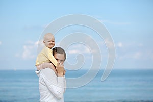 Mother and adorable smiling baby cuddling