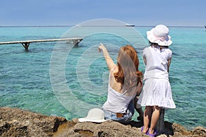 Mother ans daughter tourist formentera turquoise photo