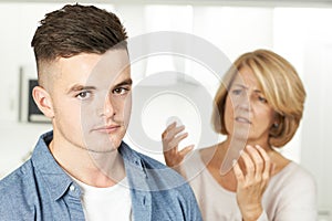 Mother Arguing With Teenage Son At Home