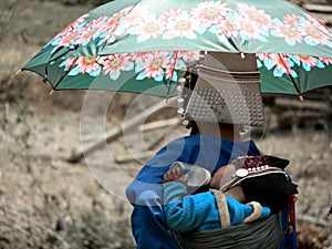 Mother and baby from Akha Hill Tribe photo