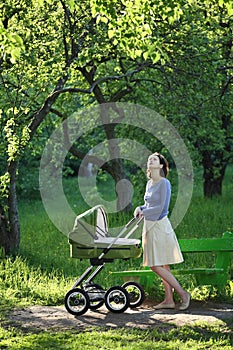 Mother with baby carriage