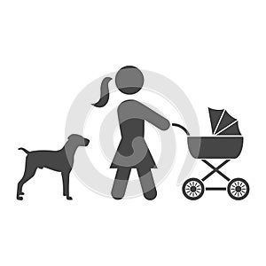 Mother with baby carriage walking with dog