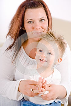 Mother and baby clapping