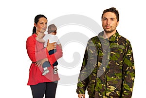 Mother with baby come to military father