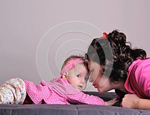 Mother and baby communicating