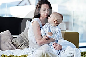 Mother, baby and depression in the bedroom is sad and need help with mental health and raise children. Newborn, parent