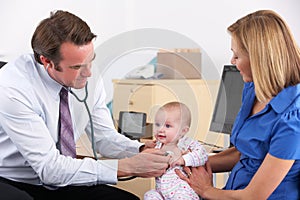 Mother and baby in doctor's surgery