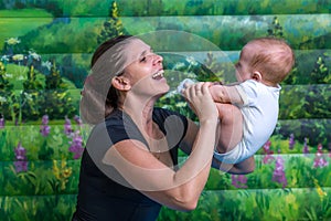 Mother with baby doing gymnastics