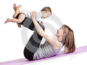 Mother with baby doing gymnastics and fitness