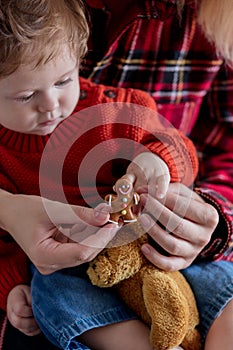 Mother and baby holding gingerman cookie