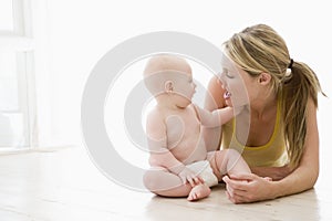 Mother and baby indoors