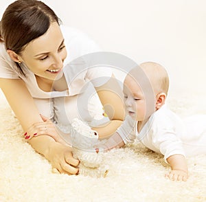 Mother and Baby, Kid Raising Head, Family Playing Toy Bear