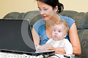 Mother, baby and laptop