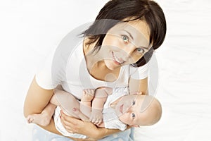 Mother and Baby, Mom Holding Newborn Kid on Hands, Infant Child