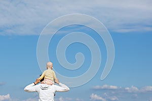 Mother and baby observing the cloudscape