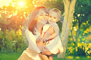 Mother and baby outdoors