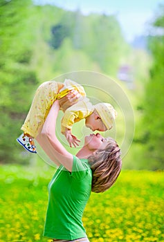 Mother with baby in the park