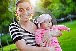 Mother and baby in park