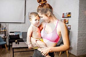 Mother and baby portrait at home