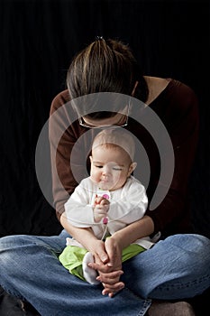 Mother and baby praying