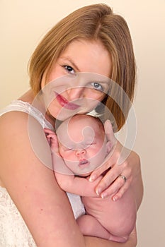 Mother with baby smiling