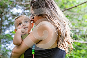 Mother and baby son, outdoor portraits