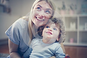 Mother and baby son spending time together.