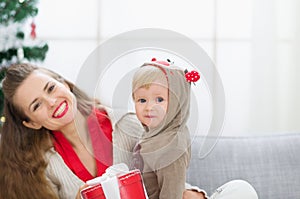 Mother and baby spending Christmas time together