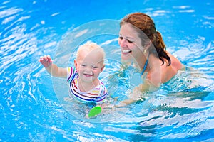 Mother and baby in swiming pool