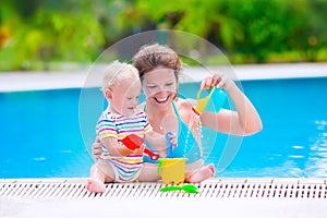 Mother and baby in swiming pool