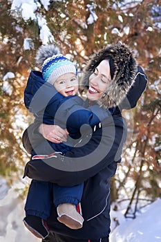 Mother and baby on winter walk