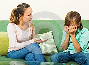 Mother berating teenager son